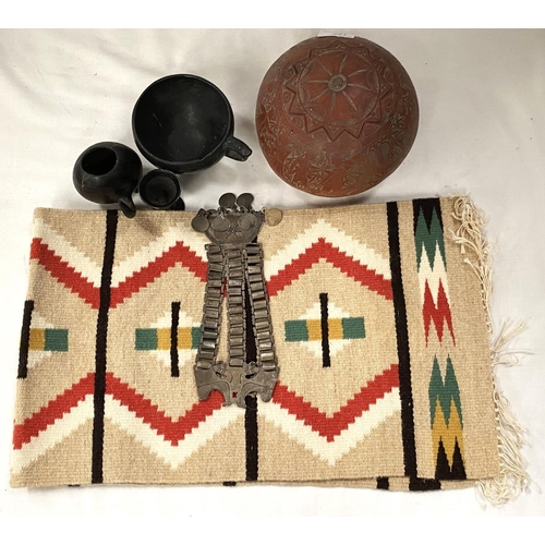 155 - A South American carved gourd; other South American items