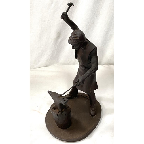 162 - A limited edition bronzed resin figure:  Blacksmith at work, signed J Winter , 20/5000No bids sold w... 