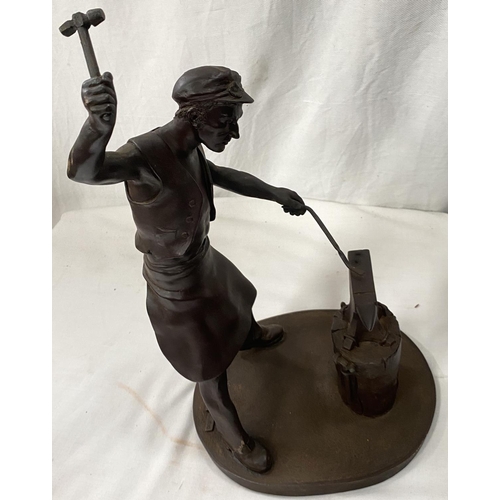162 - A limited edition bronzed resin figure:  Blacksmith at work, signed J Winter , 20/5000No bids sold w... 