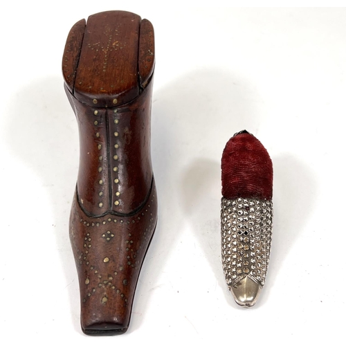 166 - A 19th century novelty snuff box in the form of a boot; a novelty silver pin cushion in the form of ... 