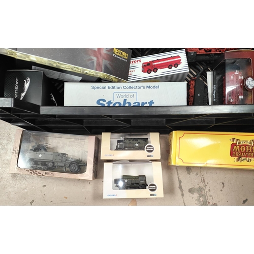 228 - A selection of diecast boxed military and other vehicles including Oxford Military, Altas, Dinky etc