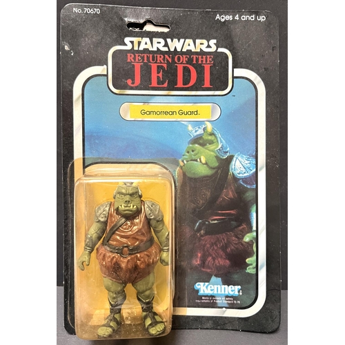 253 - A Kenner Return of the Jedi figure:  Gamorrean Guard, on card in (yellowed) blister pack, 3.75