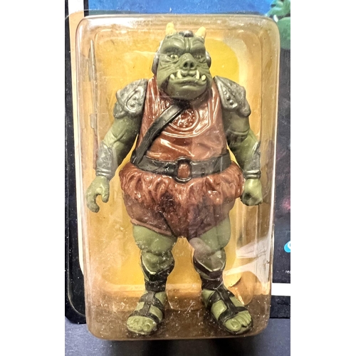 253 - A Kenner Return of the Jedi figure:  Gamorrean Guard, on card in (yellowed) blister pack, 3.75