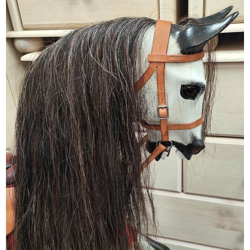 314 - ROCKING HORSE: A Stephenson Brothers England large dappled grey swing action Rocking Horse, 2008, no... 