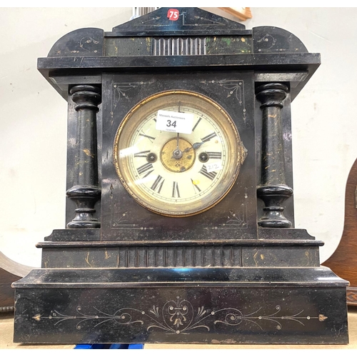34 - A 19th century mantel clock in architectural ebonised and marble effect case, with American striking... 