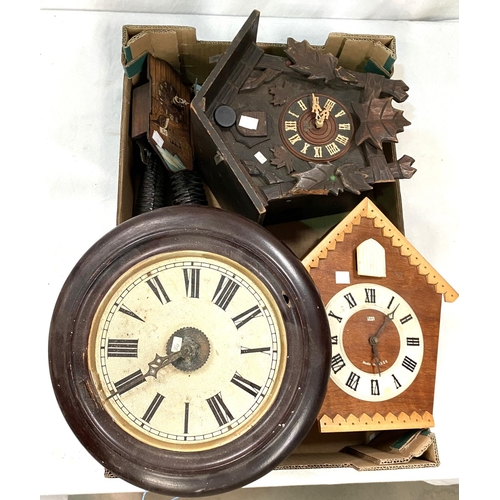 35 - A 19th century Postman's Alarm; a black forest cuckoo clock; similar clocks