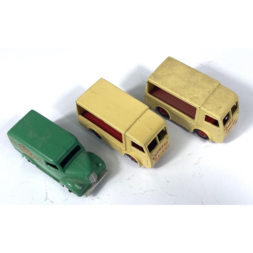 357 - DINKY TOY'S: 454 a Trojan Cydrax van; two 490 N.B.C Electric 30V vans, in cream with red hub caps, J... 