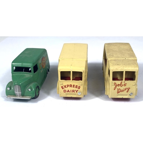 357 - DINKY TOY'S: 454 a Trojan Cydrax van; two 490 N.B.C Electric 30V vans, in cream with red hub caps, J... 