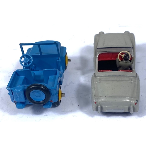 362 - DINKY TOYS: 25J Jeep light blue body with yellow hubcaps; 105 Triumph TR2 grey body red interior and... 