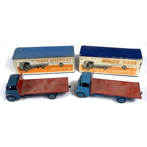 393 - DINKY TOYS: Two 512 one Supertoys Guy Flat Truck, one dark blue with red flat bed one light blue wit... 