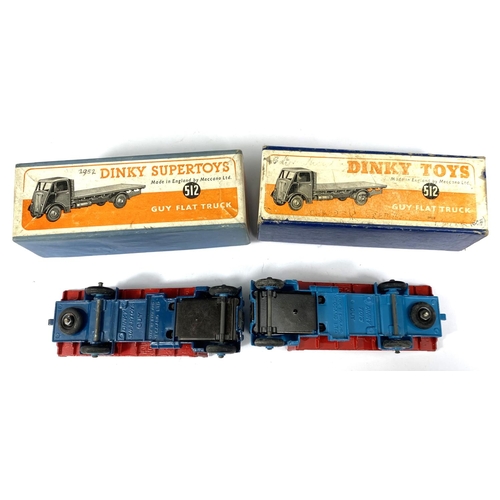 393 - DINKY TOYS: Two 512 one Supertoys Guy Flat Truck, one dark blue with red flat bed one light blue wit... 