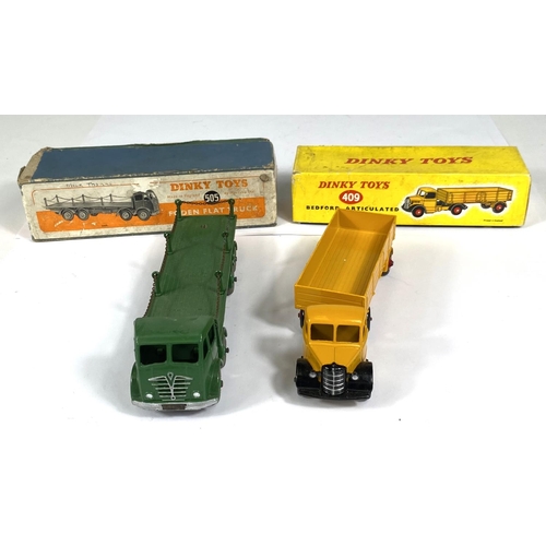 403 - DINKY TOYS: 409 Bedford Articulated Lorry, yellow with box; 505 Foden Flat Truck with Chains in dark... 