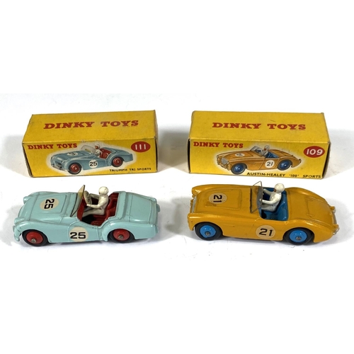 410 - DINKY TOYS: 109 Austin-Healey '100' Sports yellow body with blue interior and hubcaps in original bo... 