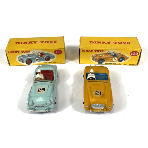 410 - DINKY TOYS: 109 Austin-Healey '100' Sports yellow body with blue interior and hubcaps in original bo... 