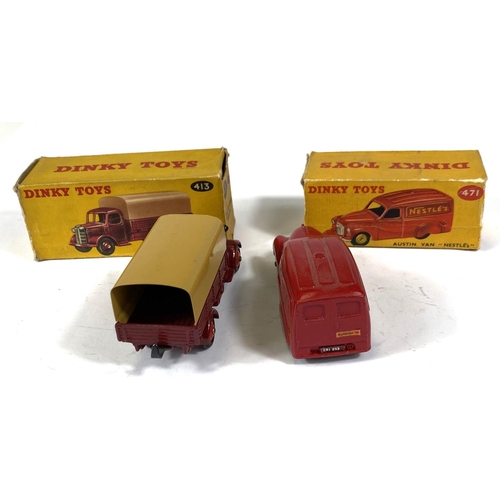 414 - DINKY TOYS: 413 Austin covered wagon in maroon with tan cover, red hub caps in box (box worn, flaps ... 