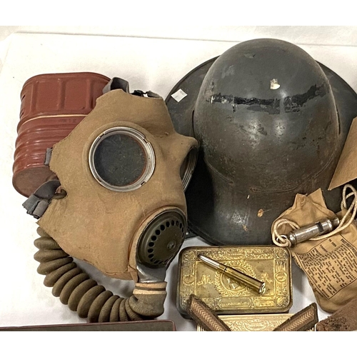 5 - Two 1914 cigarette boxes; a British WWII helmet; militaria; etc.