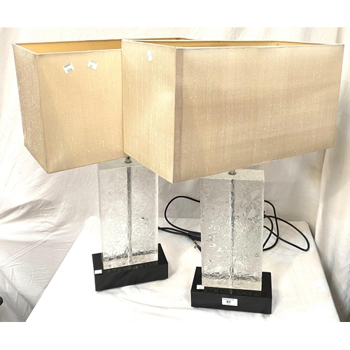 51 - A modern pair of table lamps formed from rectangular etched glass columns on marble bases