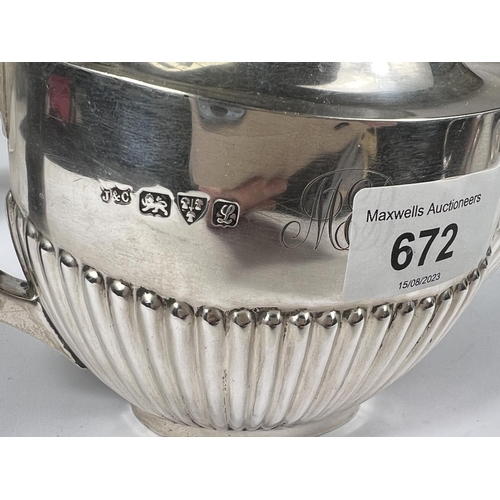 672 - A hallmarked silver bachelors 3 piece tea set in the Georgian oval fluted style