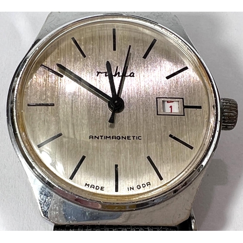 675 - RHULA: vintage mechanical watch, date aperture.