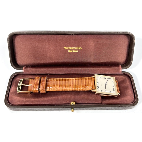 694 - TIFFANY &amp; CO WATCH: a c 1940's 14ct gold cased gent's dress watch marked Tiffany &amp; Co, on me...