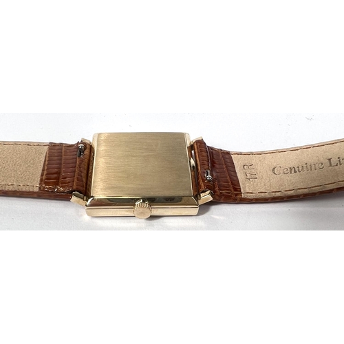 694 - TIFFANY & CO WATCH: a c 1940's 14ct gold cased gent's dress watch marked Tiffany & Co, on me... 