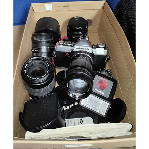 71 - A vintage Minolta XG1 with soldier telephoto lense; three other lenses and accessories; a digital Ca... 