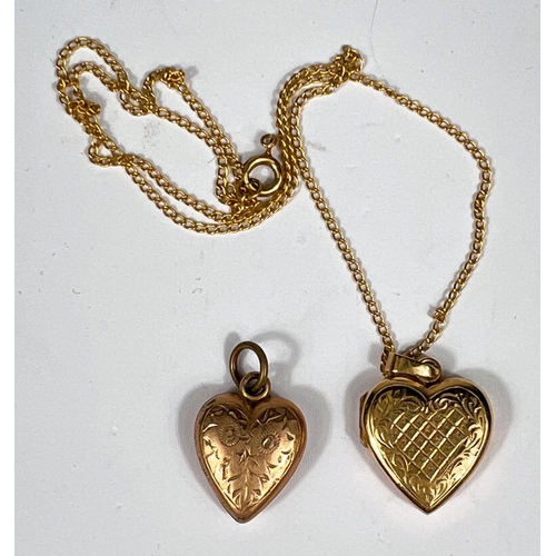 715 - A 9ct hallmarked gold heart locket on fine chain, 5.5gm and a gold plated heart locket. 