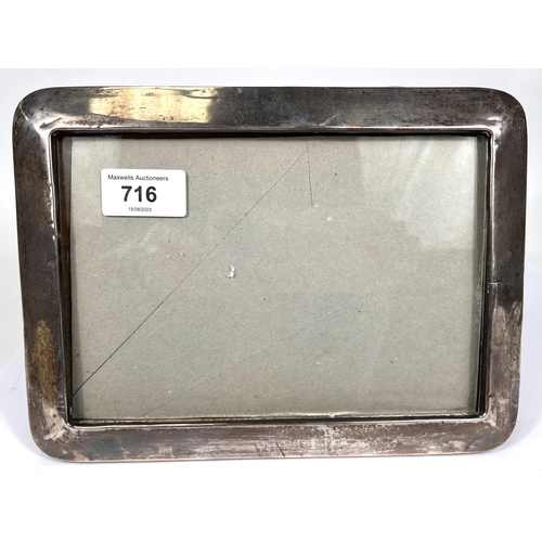 716 - A silver plain rectangular photo frame, Birmingham 1918, 25 x 18cm