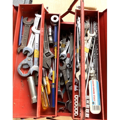 74 - A large collection of tools in various tool boxes, a Stanley plane etc