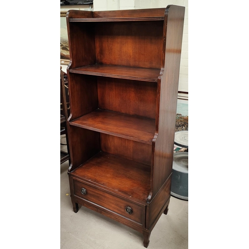 793 - A reproduction mahogany 4 height waterfall bookcase with base drawer