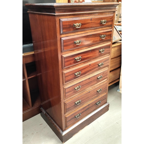 795 - A narrow Edwardian mahogany 7 height chest of drawers with brass drop handles by Maples, width 69cm ... 