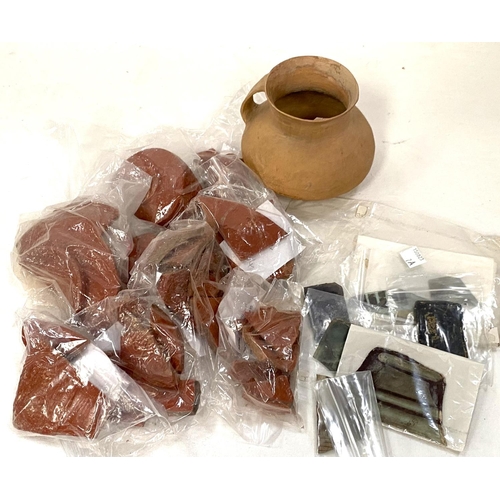 7A - A collection of ancient terracotta vessel shards and several part pieces of early stained glass.