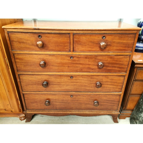 806 - A mahogany chest of three long two short drawers with ogee feet bun handles and wooden escutcheons&n... 