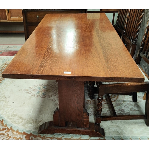 811 - An oak plank top refectory dining table, 167cm