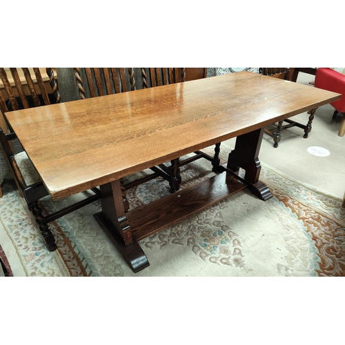 811 - An oak plank top refectory dining table, 167cm