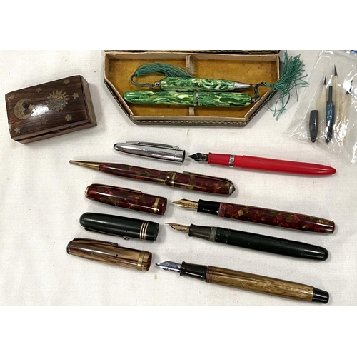 81A - 4 vintage fountain pens and a propelling pencil; an inlaid small box; a fountain pen & pencil se... 