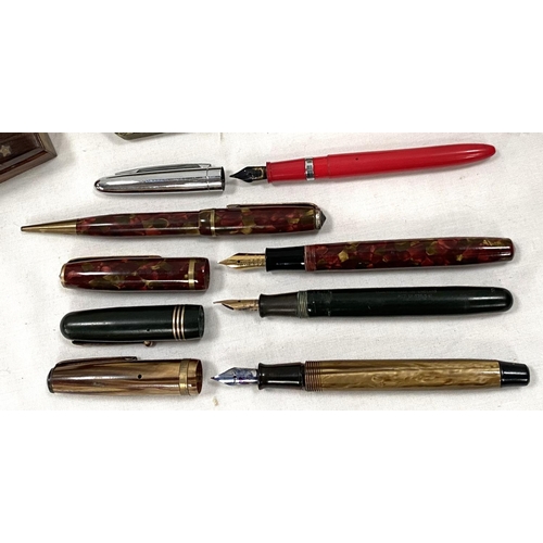 81A - 4 vintage fountain pens and a propelling pencil; an inlaid small box; a fountain pen & pencil se... 