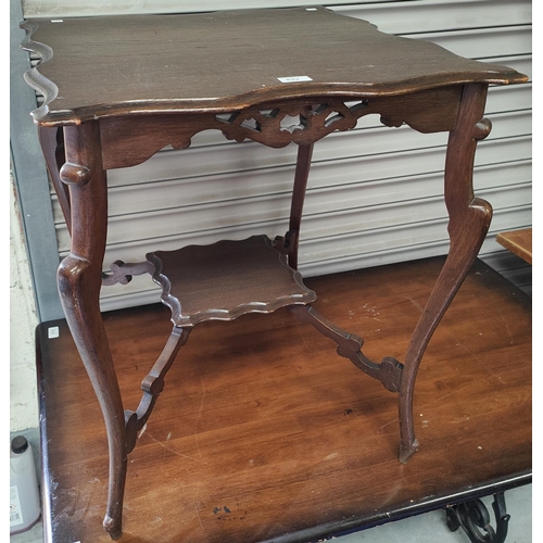 833 - An Edwardian oak occasional table with scalloped square top, fretwork frieze and undershelf; A 1930'... 