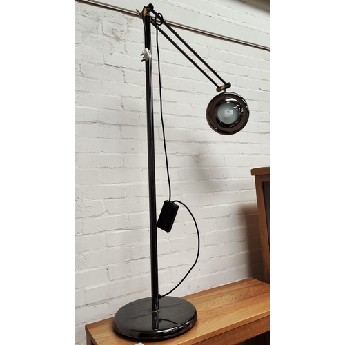 842 - A metal angle poise standard reading light; a similar uplight