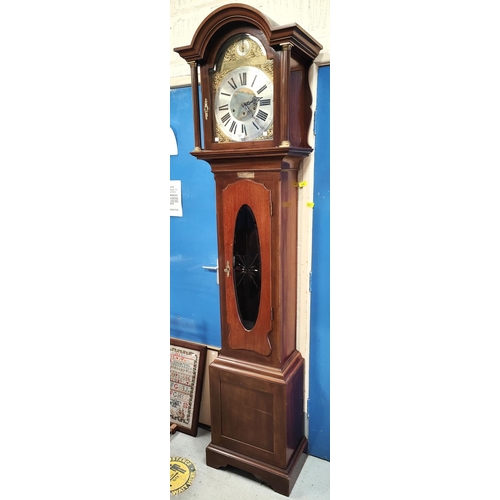 857 - An early 20th century Georgian style mahogany longcase clock with arched hood, brass dial and spring... 