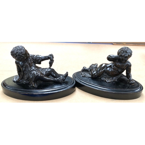 86 - Two bronze figures of children on ebonised plaques.