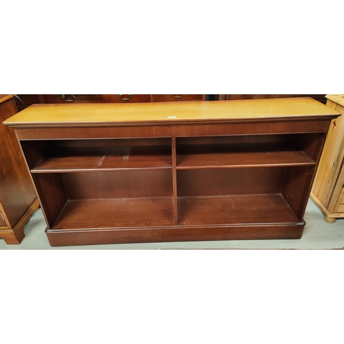 879 - A mahogany reproduction bookcase with central divide, two height, length 153 x 77cm