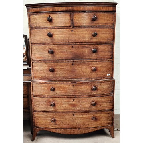 891 - A late Georgian inlaid mahogany bow front chest on chest six long and two short drawers on ogee brac... 