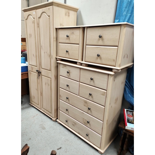 897 - A modern limed oak effect four piece bedroom suite, comp. a double wardrobe, a tall chest of 4 short... 