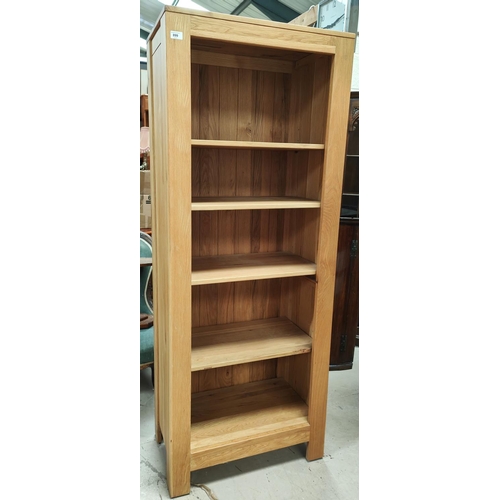 899 - A tall light oak bookcase, five height, 179 x 70 x 40cm