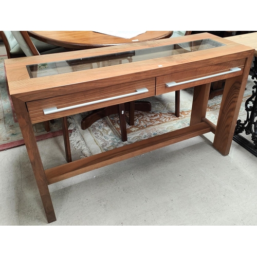 904 - A modern side table by John Lewis, cherry effect with inset glass panels and 2 frieze drawers