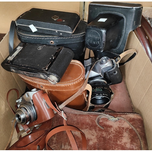 92 - Three pre-war folding cameras:  No 2 Folding Brownie; Butchers Carbine & Kodak Junior; a Ze... 