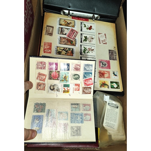 94 - A stamp collection in various albums and stockbooks; etc.