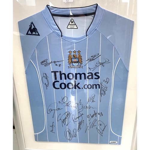 98 - An MCFC shirt 'Thomas Cook.com' with multiple signatures; a print of ships, after David Shepherd