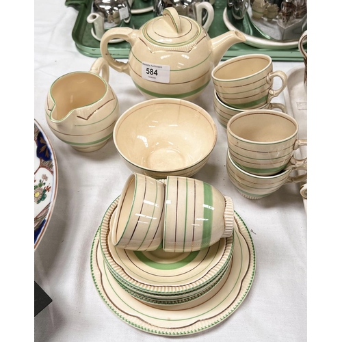 584 - A Clarice Cliff tea set, circa 1946, with green and gilt line decoration, comprising 6 saucers, 6 cu... 